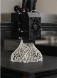 3D printer printing a delicate lattice structure